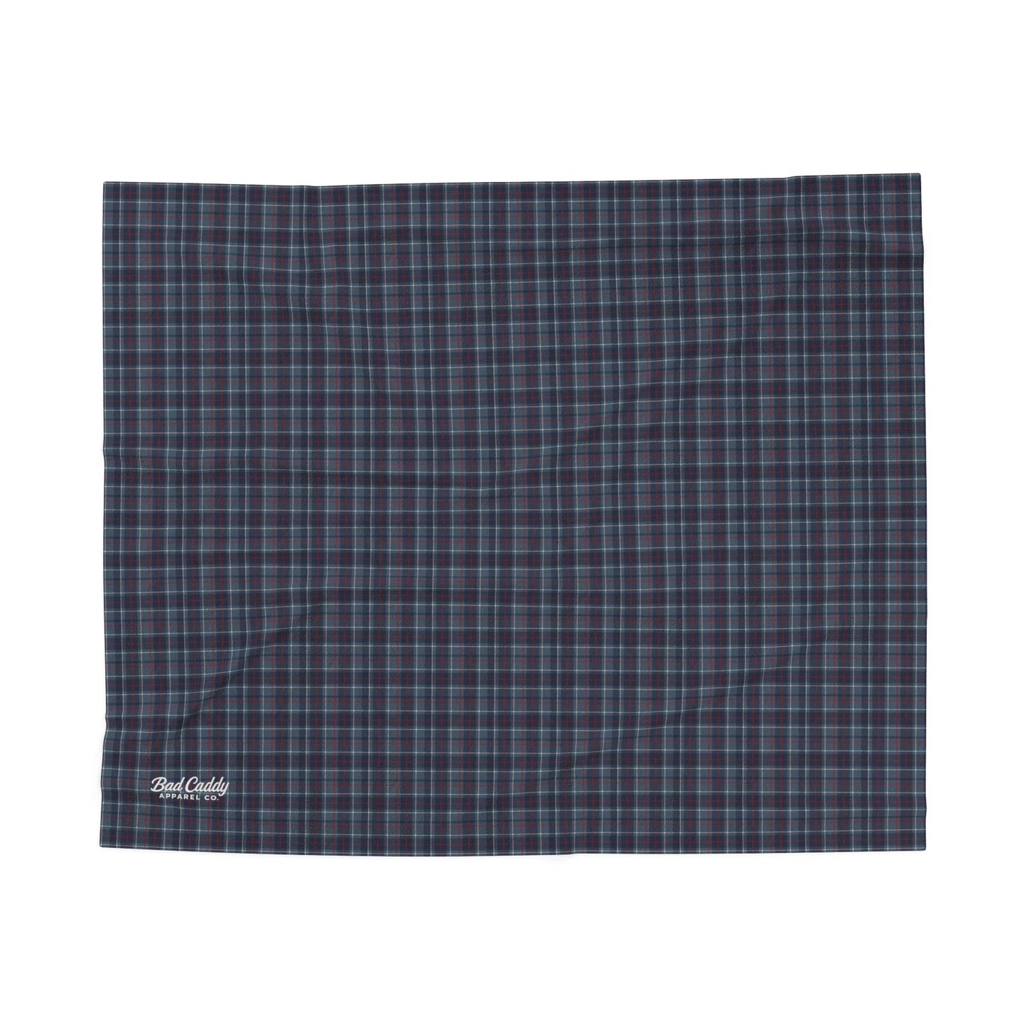 Plaid blanket with a visible brand logo on a white background