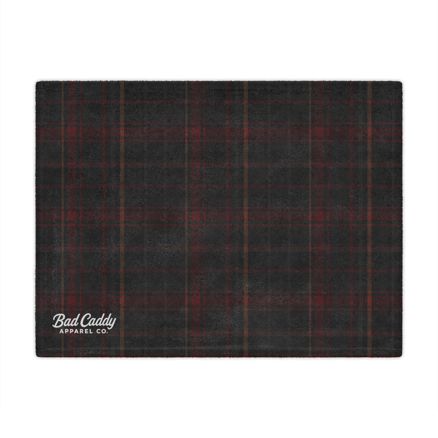 Black and red plaid fabric with 'Bad Caddy Apparel Co.' logo on a white background