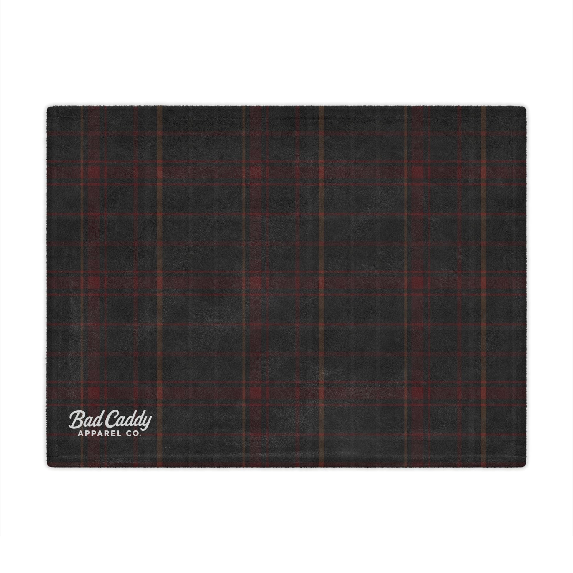 Black and red plaid fabric with 'Bad Caddy Apparel Co.' logo on a white background